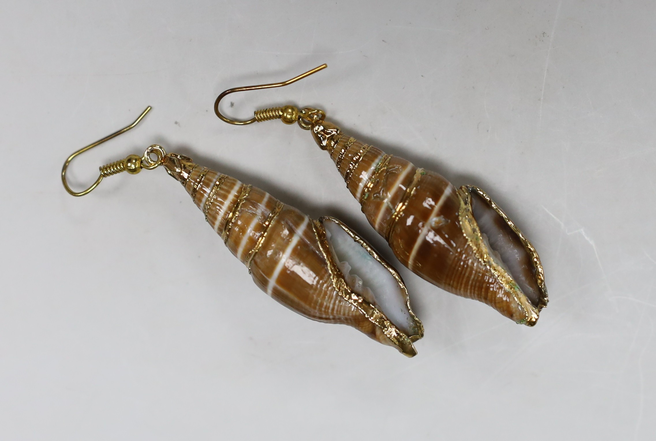 Two pairs of earrings, including paste set and mounted shell.